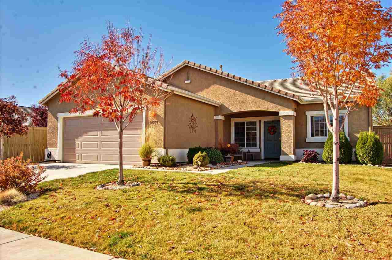 10299 Lucente Way Reno, NV 89521 - Photo 1 of 1 a backyard of a house with yard and outdoor seating