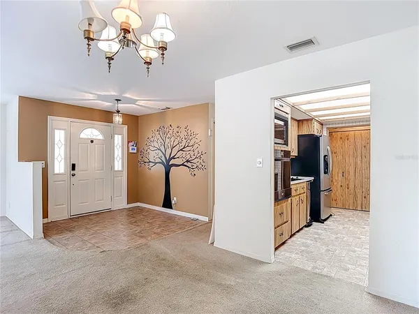 a bathroom with a sink vanity granite and a mirror