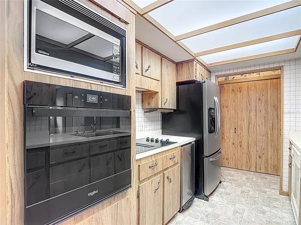 a bathroom with a shower and a window