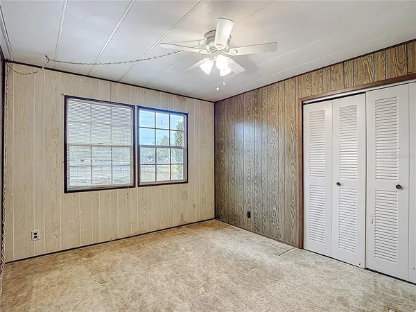 a view of empty room with windows