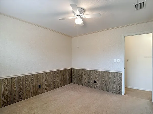 a view of a yard with swimming pool