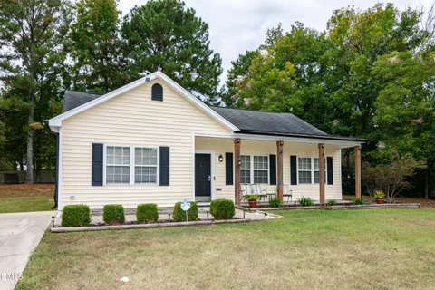 front view of a house with a yard