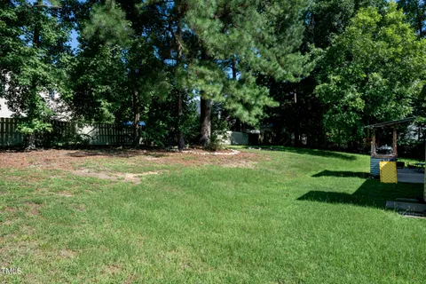 a view of a house with a big yard