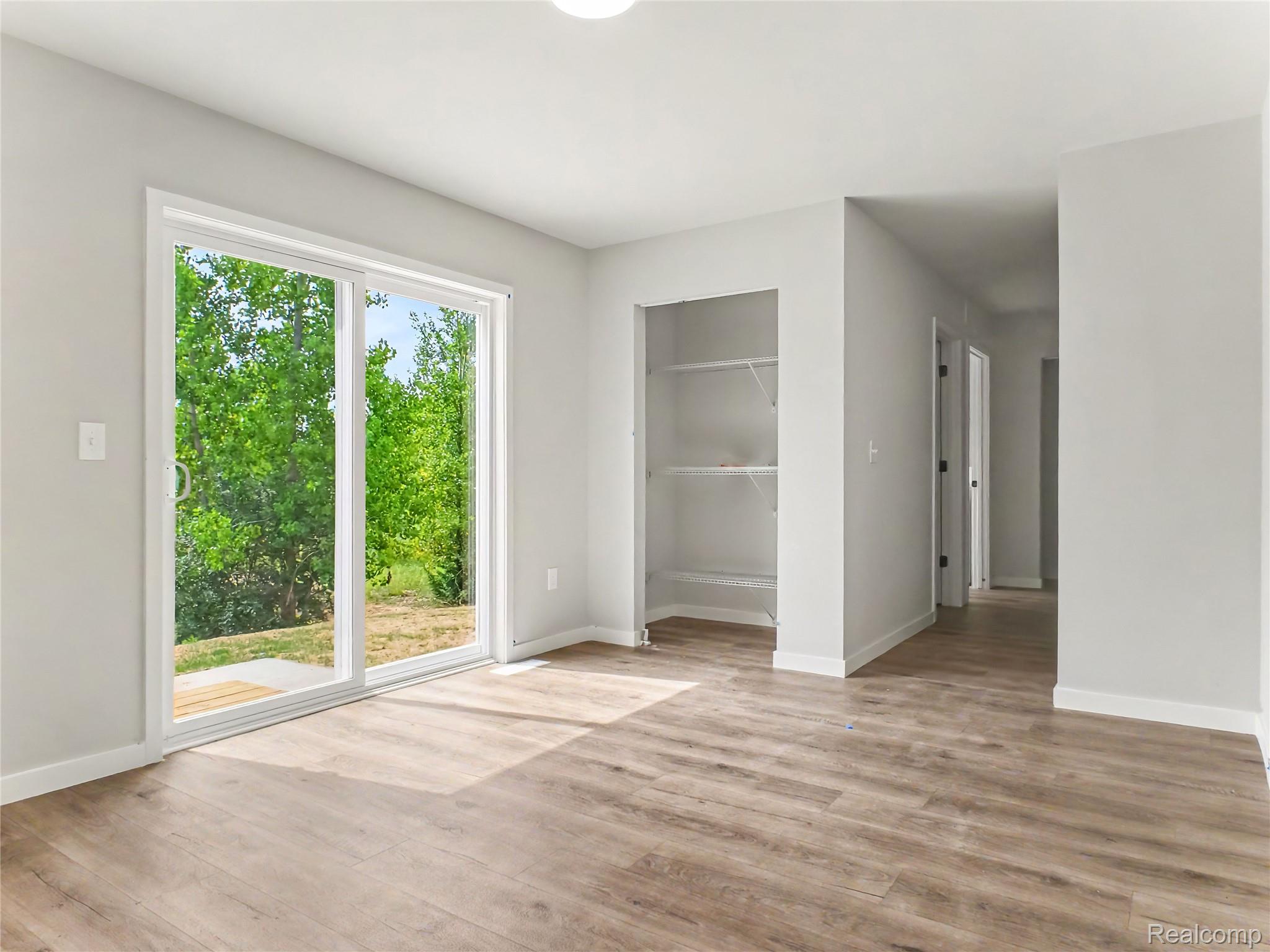 3185 Quail Ridge Court Clio, MI 48420 - Photo 6 of 35 There is a dedicated dining nook adjacent to the kitchen. Sliding doors lead to the rear yard which has a 10x10 patio – perfect for indoor/outdoor dining & entertaining.