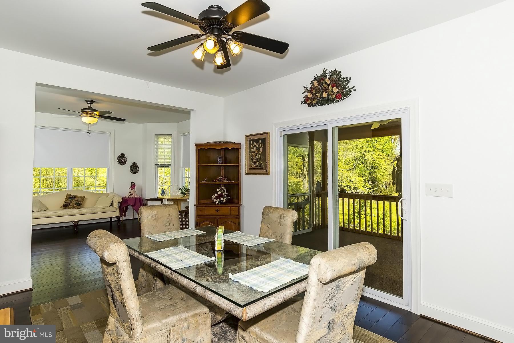 4837 Avery Road Shady Side, MD 20764 - Photo 4 of 27 Dining Room with walk-out to a screened porch