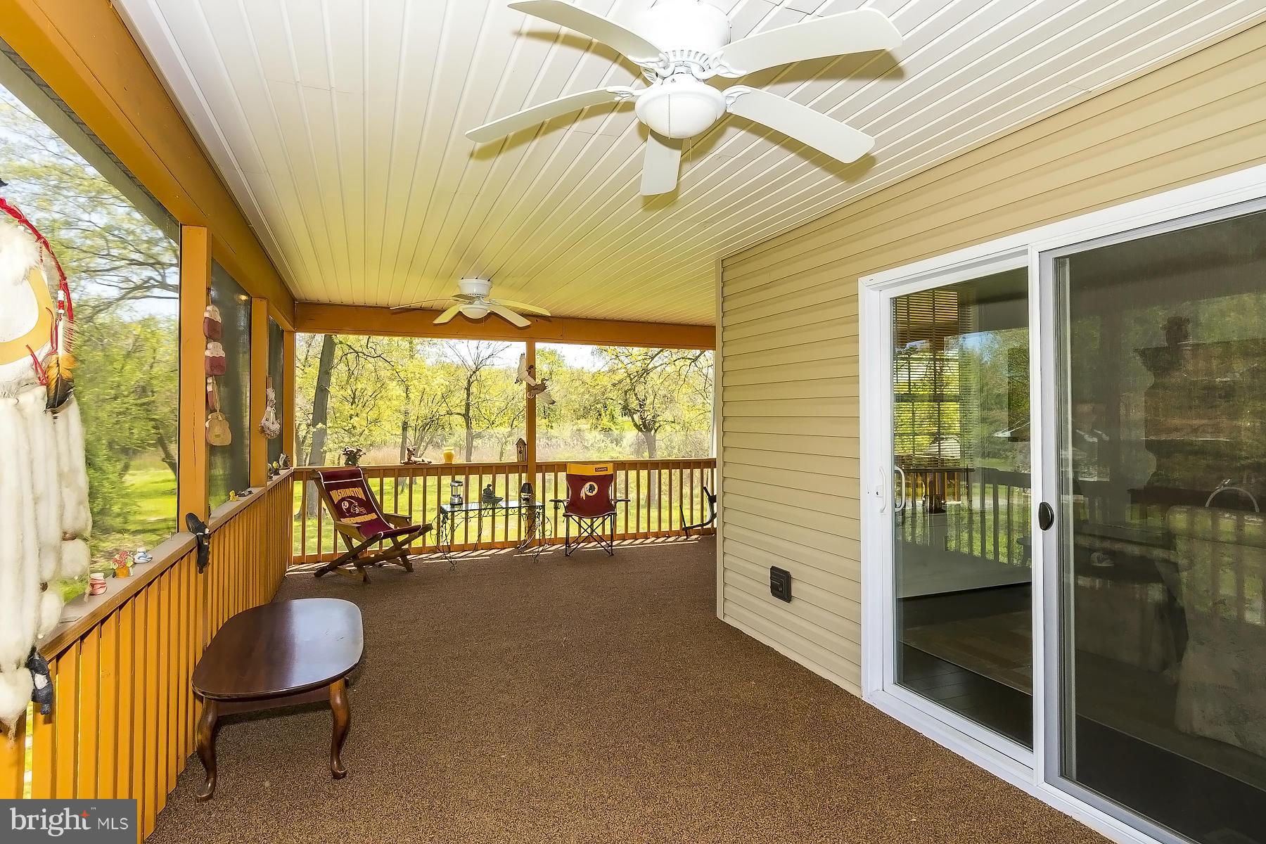 4837 Avery Road Shady Side, MD 20764 - Photo 5 of 27 Screened Porch Opens to Deck
