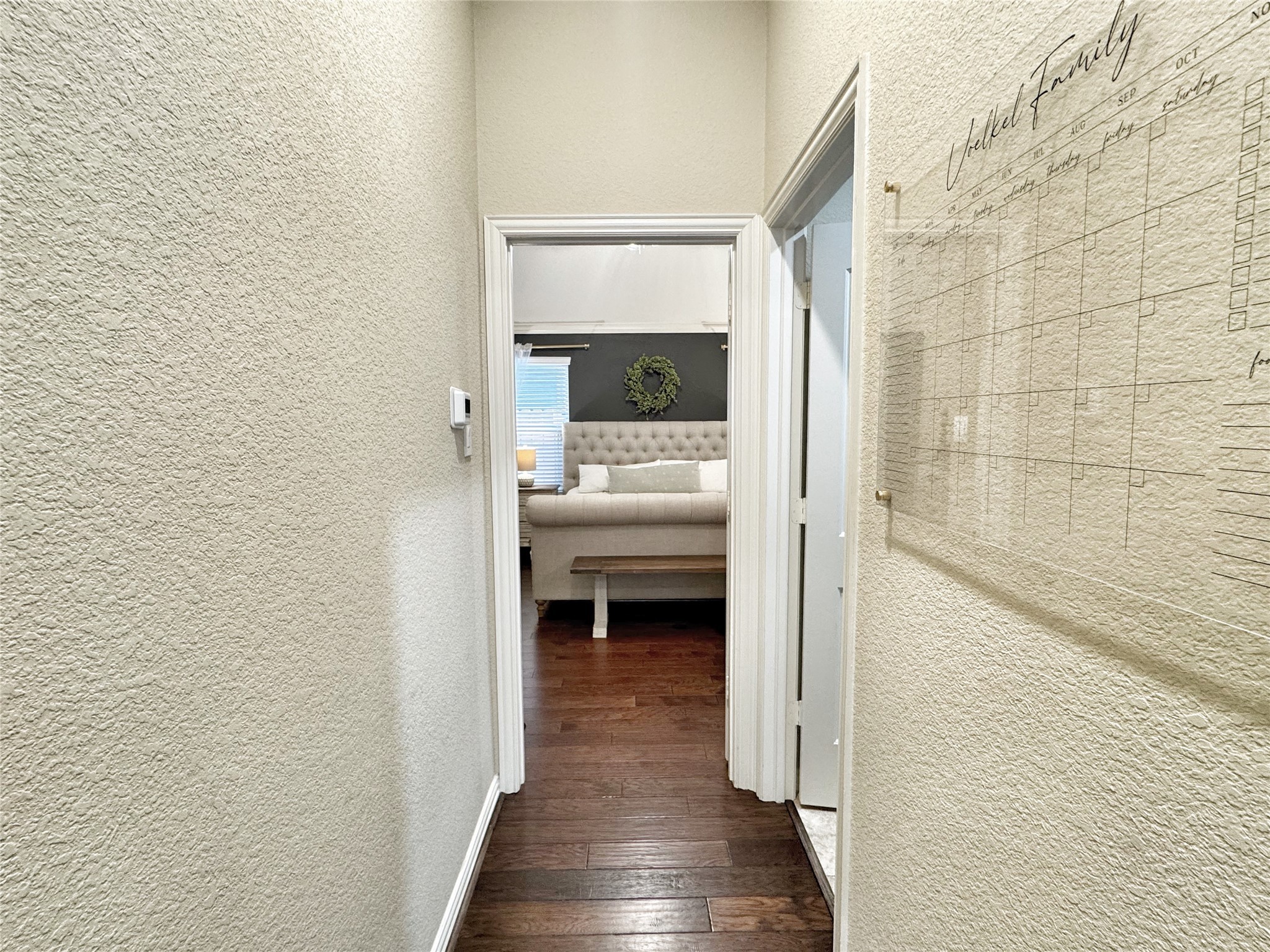 3857 Enchanted Timbers Lane Spring, TX 77386 - Photo 17 of 39 a view of bedroom with a bed and a hallway