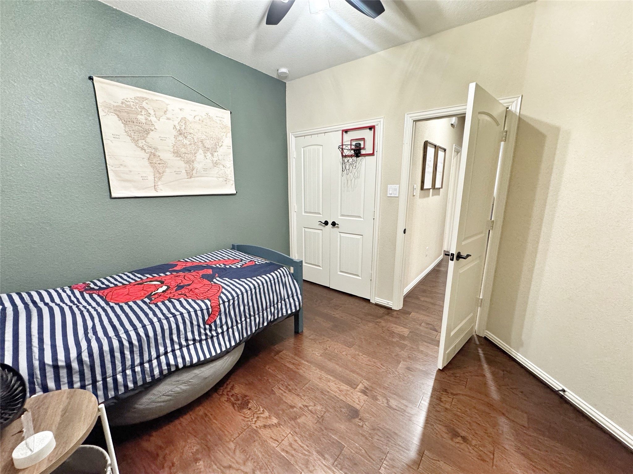 3857 Enchanted Timbers Lane Spring, TX 77386 - Photo 28 of 39 a view of a bedroom with wooden floor