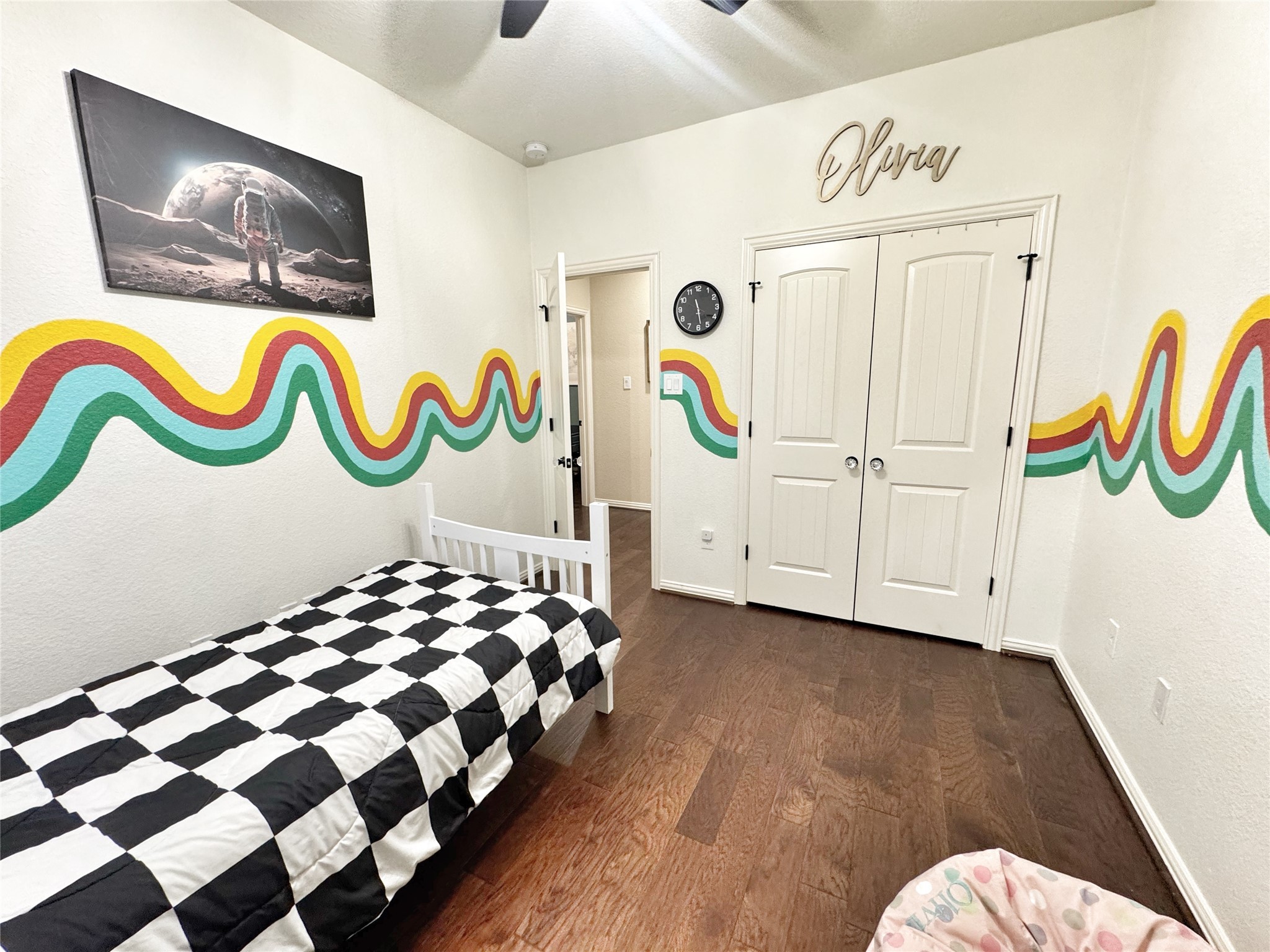 3857 Enchanted Timbers Lane Spring, TX 77386 - Photo 32 of 39 a bedroom with a bed and painting on the wall