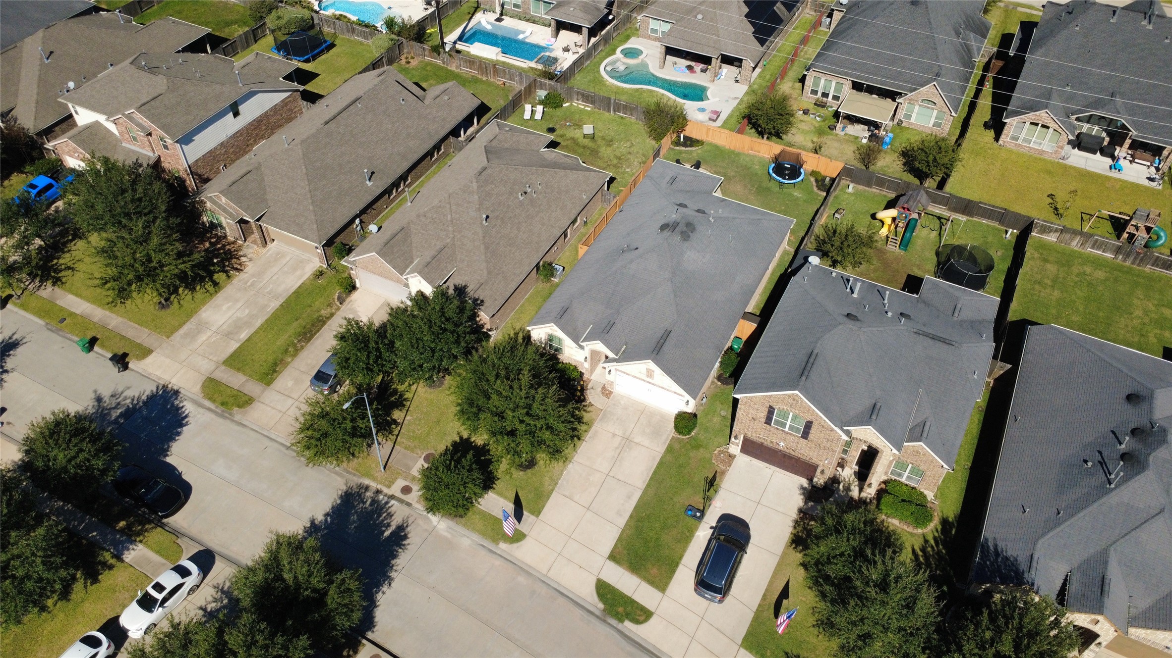 3857 Enchanted Timbers Lane Spring, TX 77386 - Photo 36 of 39 an aerial view of residential houses with outdoor space