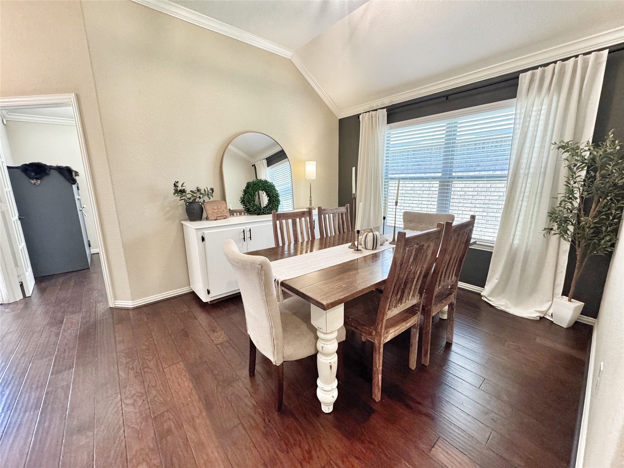 3857 Enchanted Timbers Lane Spring, TX 77386 - Photo 7 of 39 a view of a dining room with furniture window and wooden floor