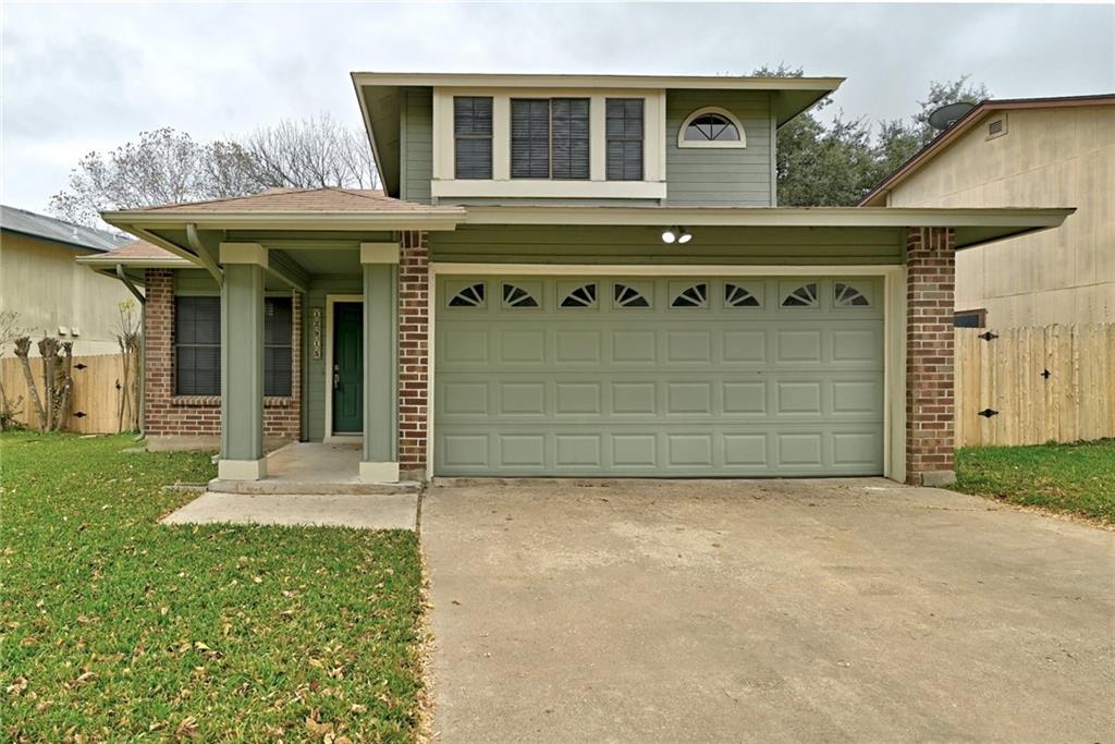 An inviting exterior displays brick accents, a two-car garage, and a covered entry column.