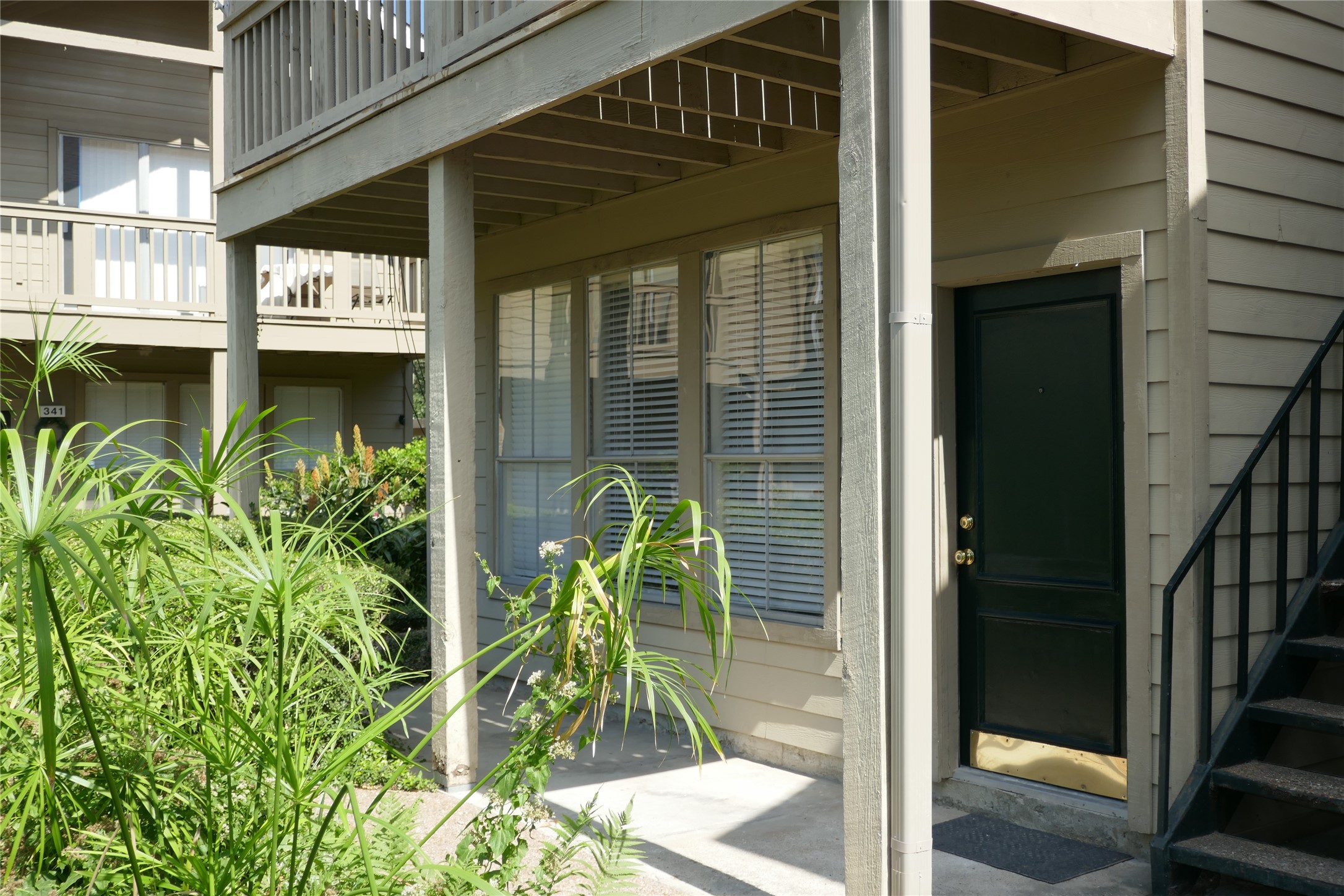 2100 Tanglewilde Street, Unit 347 Houston, TX 77063 - Photo 4 of 19 a partial view of living room with balcony