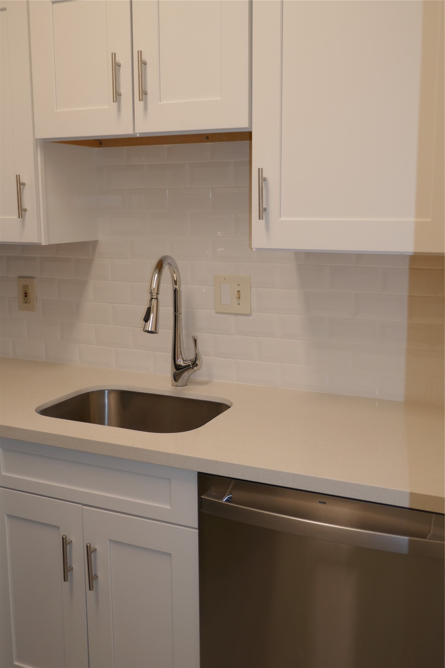 2100 Tanglewilde Street, Unit 347 Houston, TX 77063 - Photo 9 of 19 a kitchen with a sink and cabinets