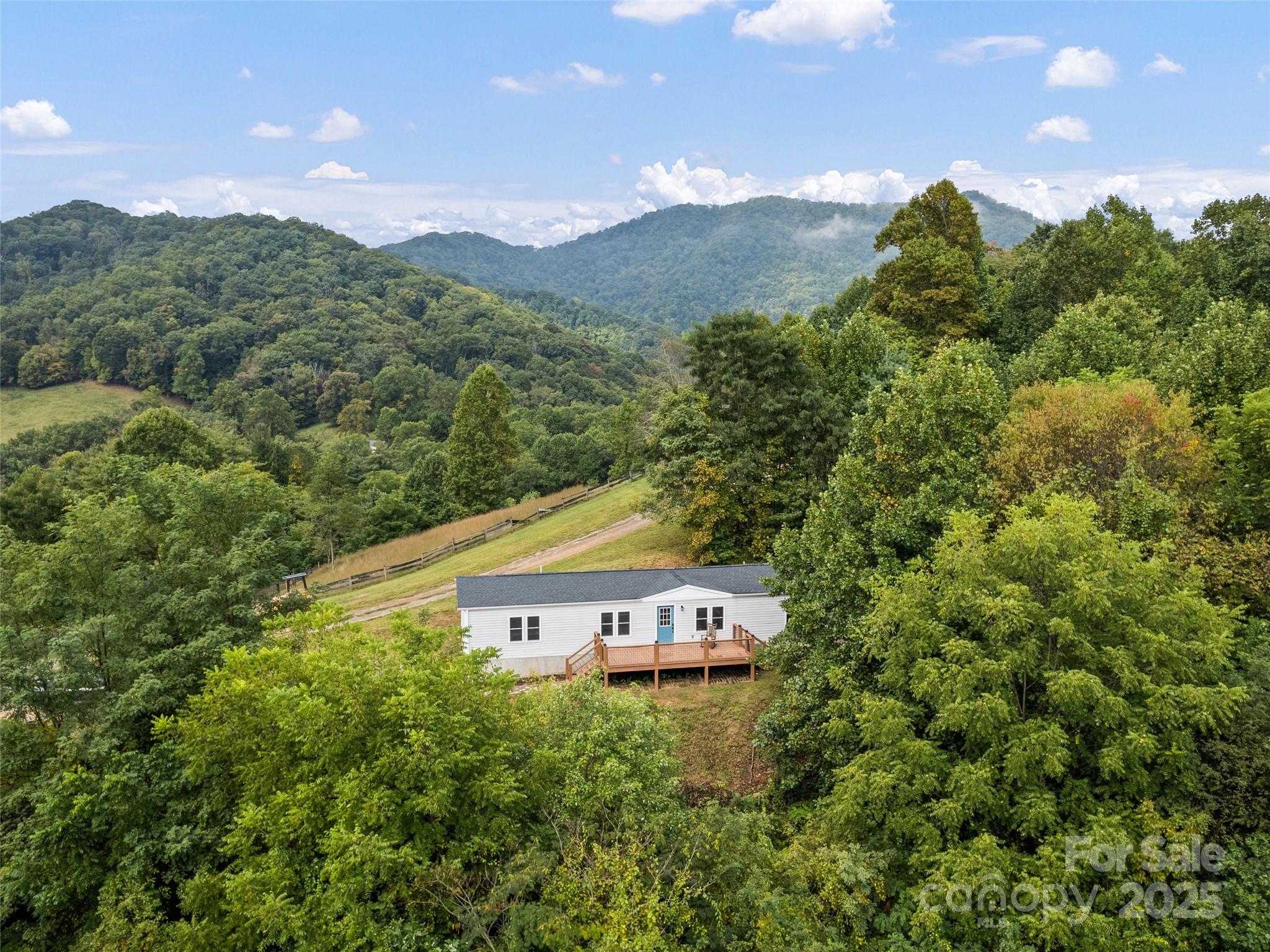 120 Simonds Ridge Canton, NC 28716 - Photo 1 of 36 a view of a house with a yard
