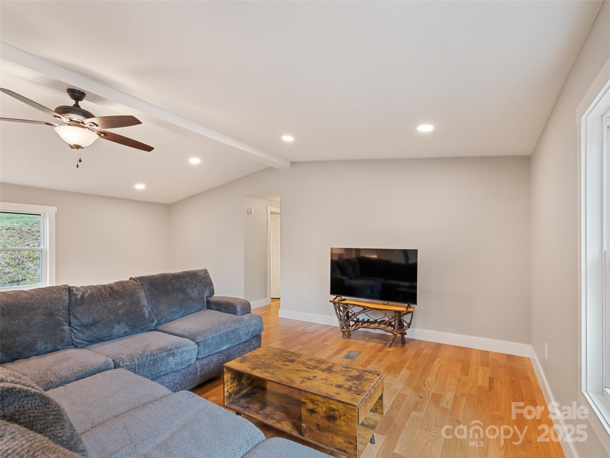 120 Simonds Ridge Canton, NC 28716 - Photo 13 of 36 a living room with furniture and a flat screen tv