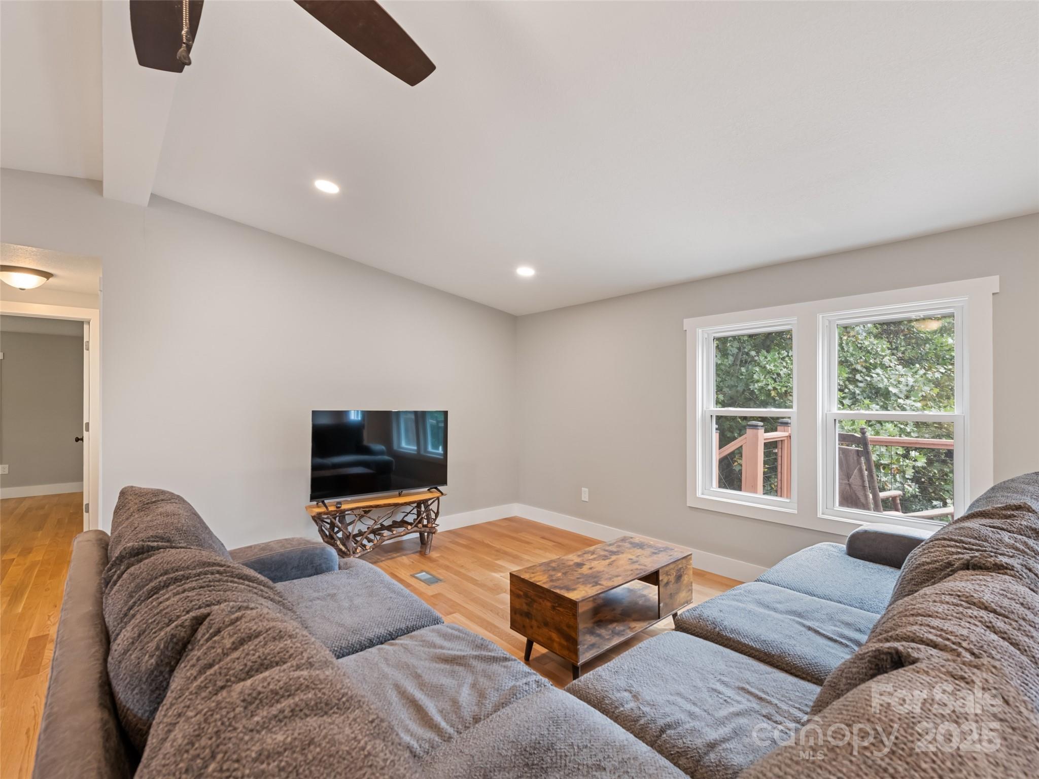 120 Simonds Ridge Canton, NC 28716 - Photo 14 of 36 a living room with furniture window and a flat screen tv