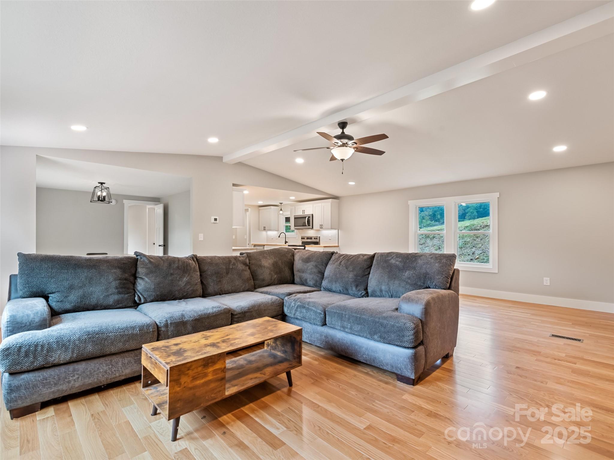 120 Simonds Ridge Canton, NC 28716 - Photo 15 of 36 a living room with furniture and a wooden floor