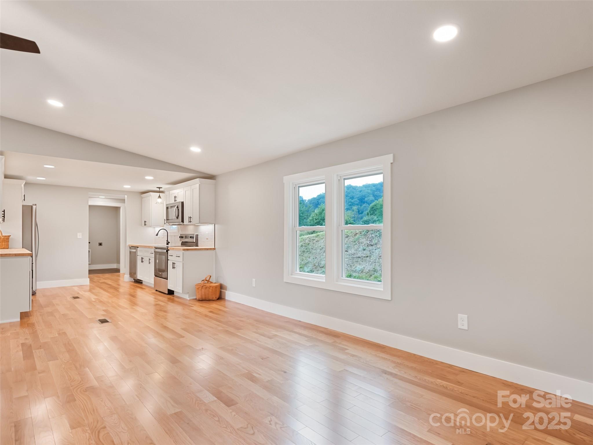 120 Simonds Ridge Canton, NC 28716 - Photo 17 of 36 a view of a kitchen with furniture and windows