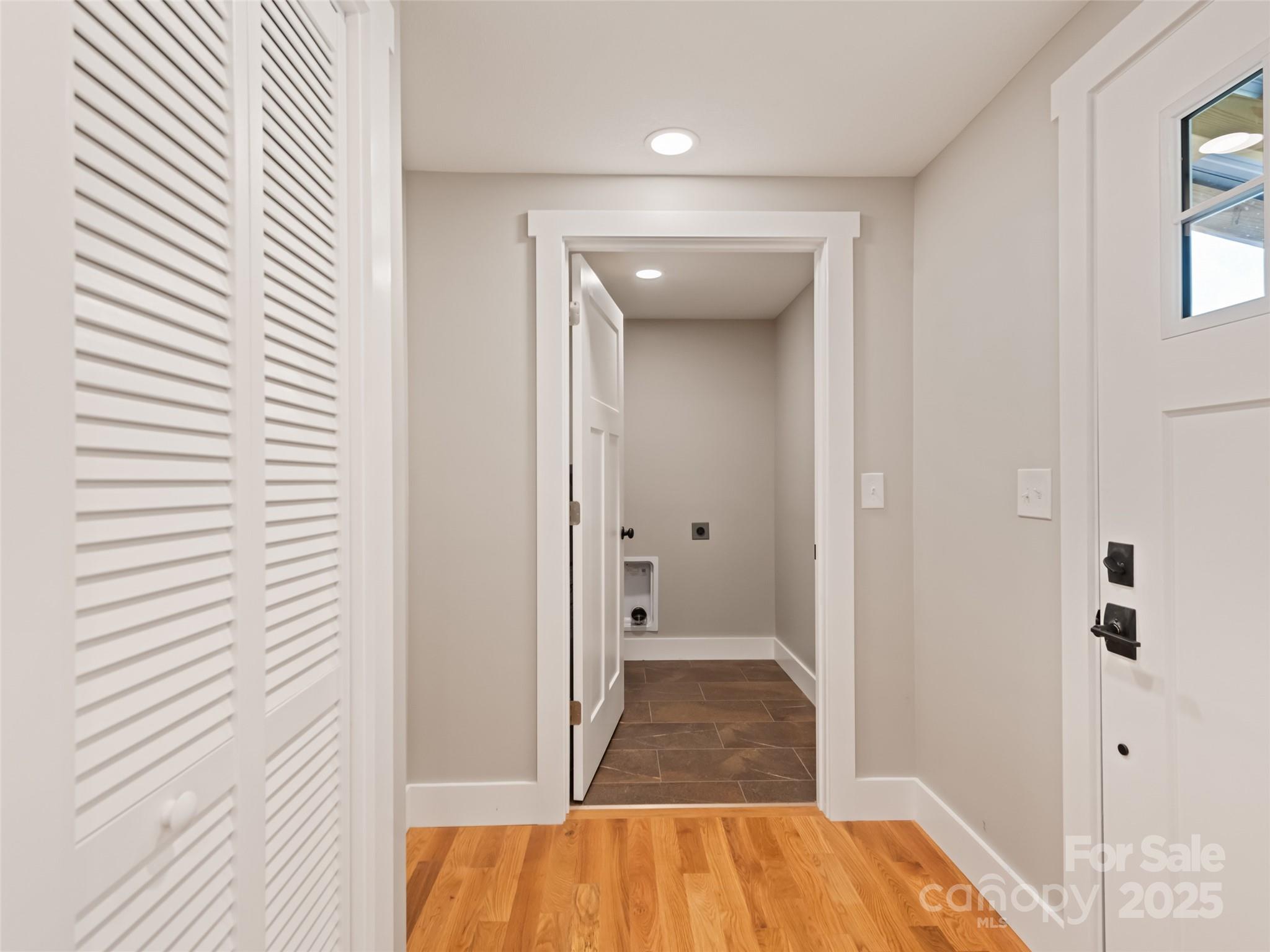 120 Simonds Ridge Canton, NC 28716 - Photo 20 of 36 a view of a hallway with wooden floor and closet
