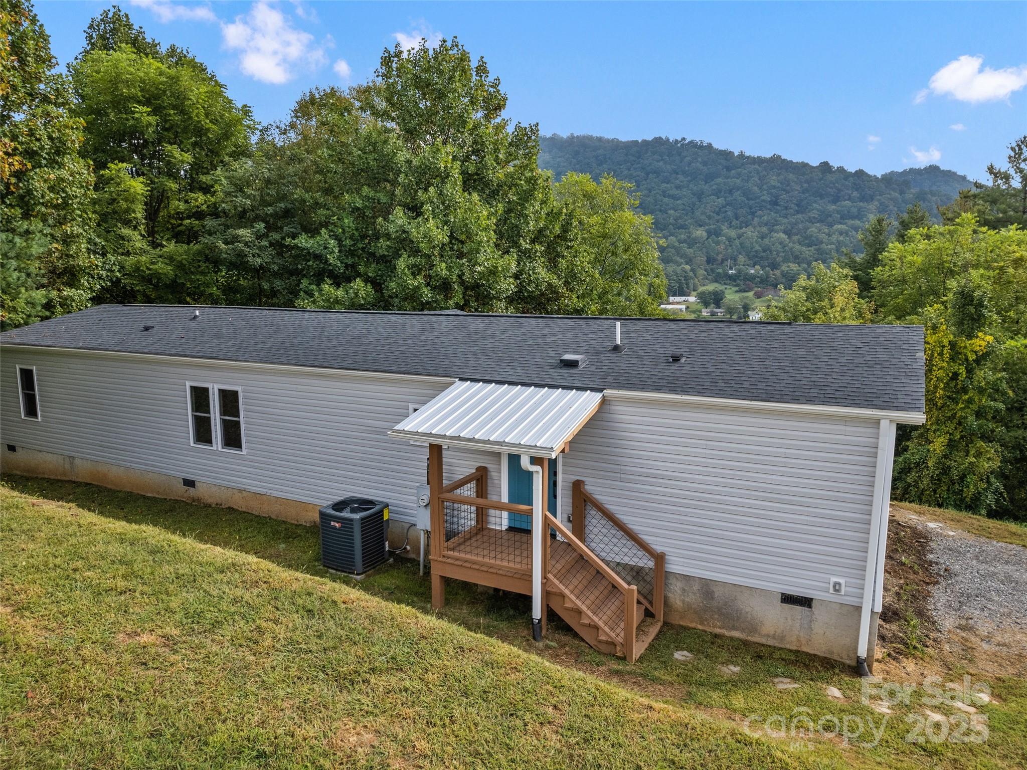 120 Simonds Ridge Canton, NC 28716 - Photo 32 of 36 a view of a house with a balcony