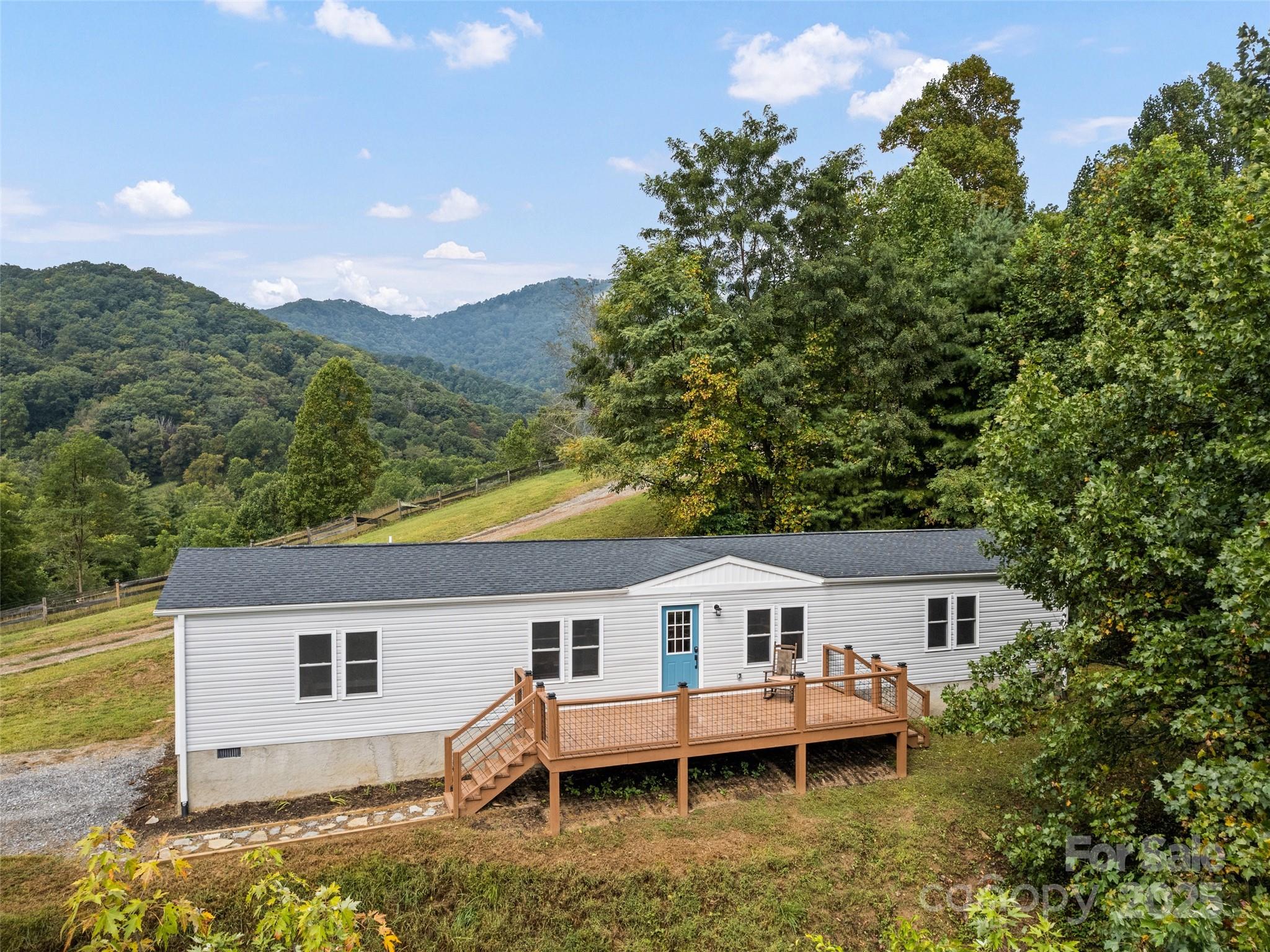 120 Simonds Ridge Canton, NC 28716 - Photo 33 of 36 a view of a house with a backyard and pool