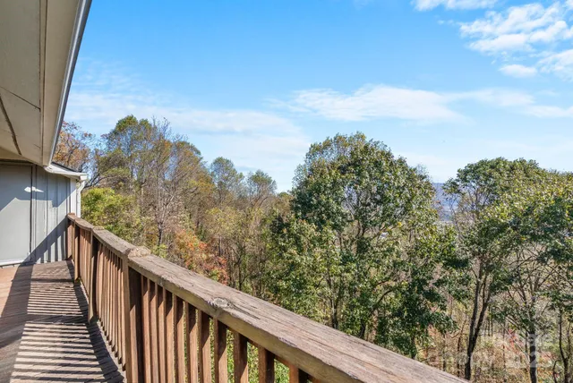 a balcony with an outdoor space
