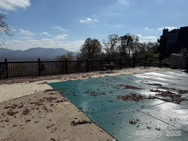 a view of a backyard of the house
