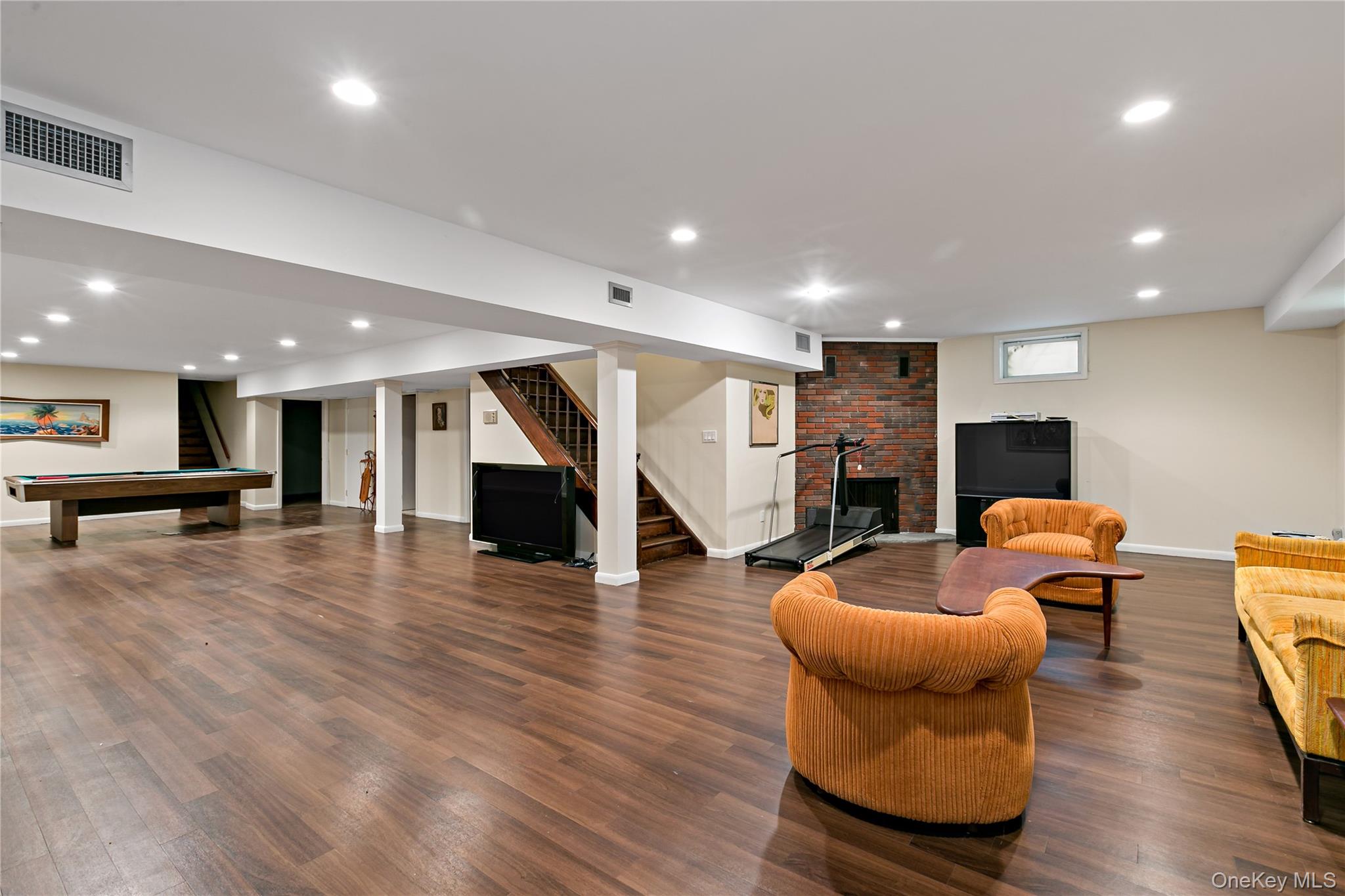 16 Meadow Road Scarsdale, NY 10583 - Photo 29 of 47 a lobby with furniture and wooden floor