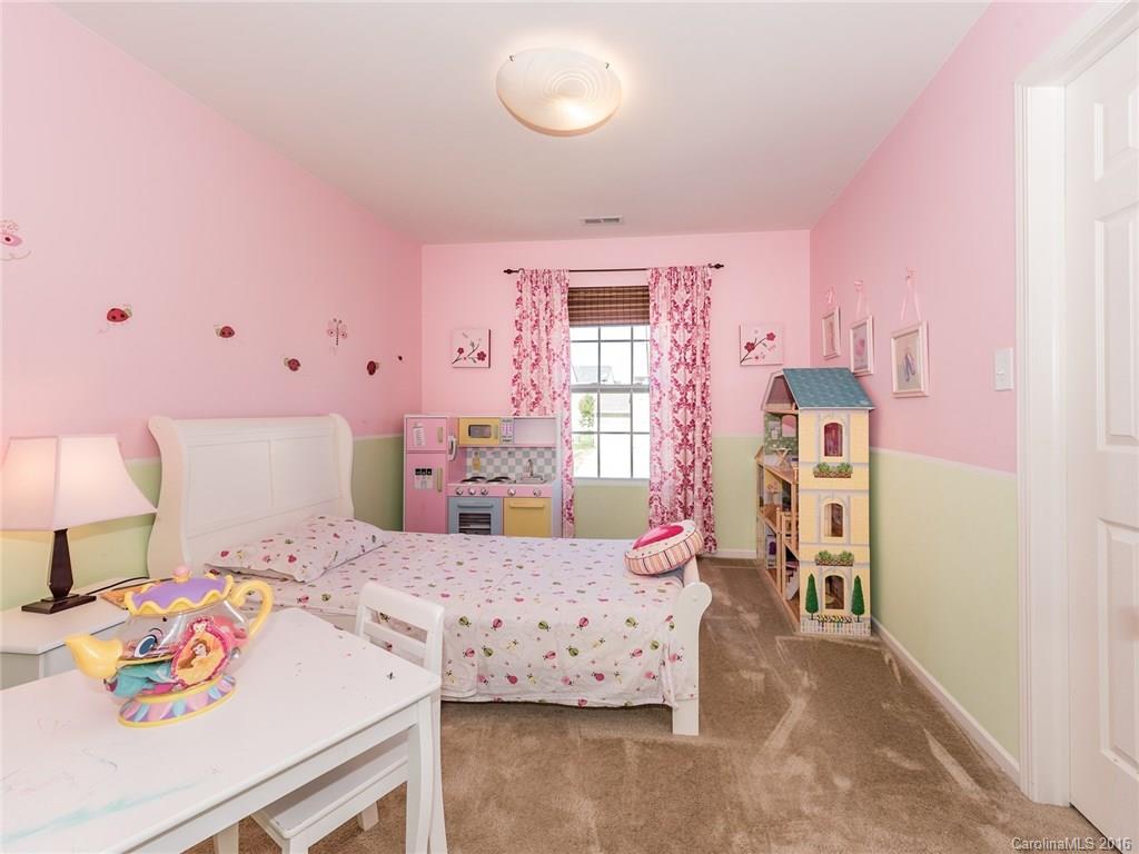2226 Durand Road Fort Mill, SC 29715 - Photo 18 of 24 a bedroom with a bed and a window