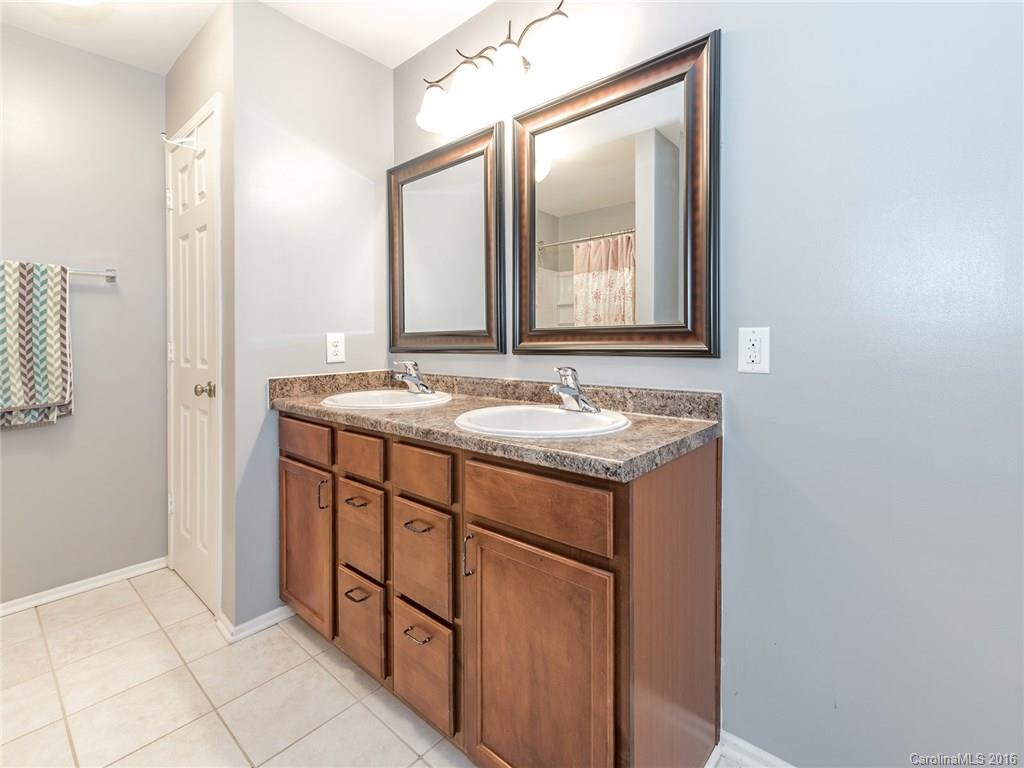 2226 Durand Road Fort Mill, SC 29715 - Photo 21 of 24 a bathroom with a sink and a mirror