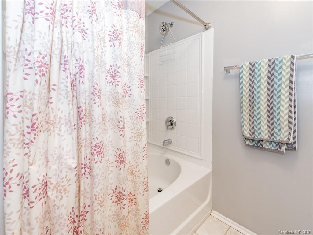 2226 Durand Road Fort Mill, SC 29715 - Photo 22 of 24 a bathroom with a bathtub and shower