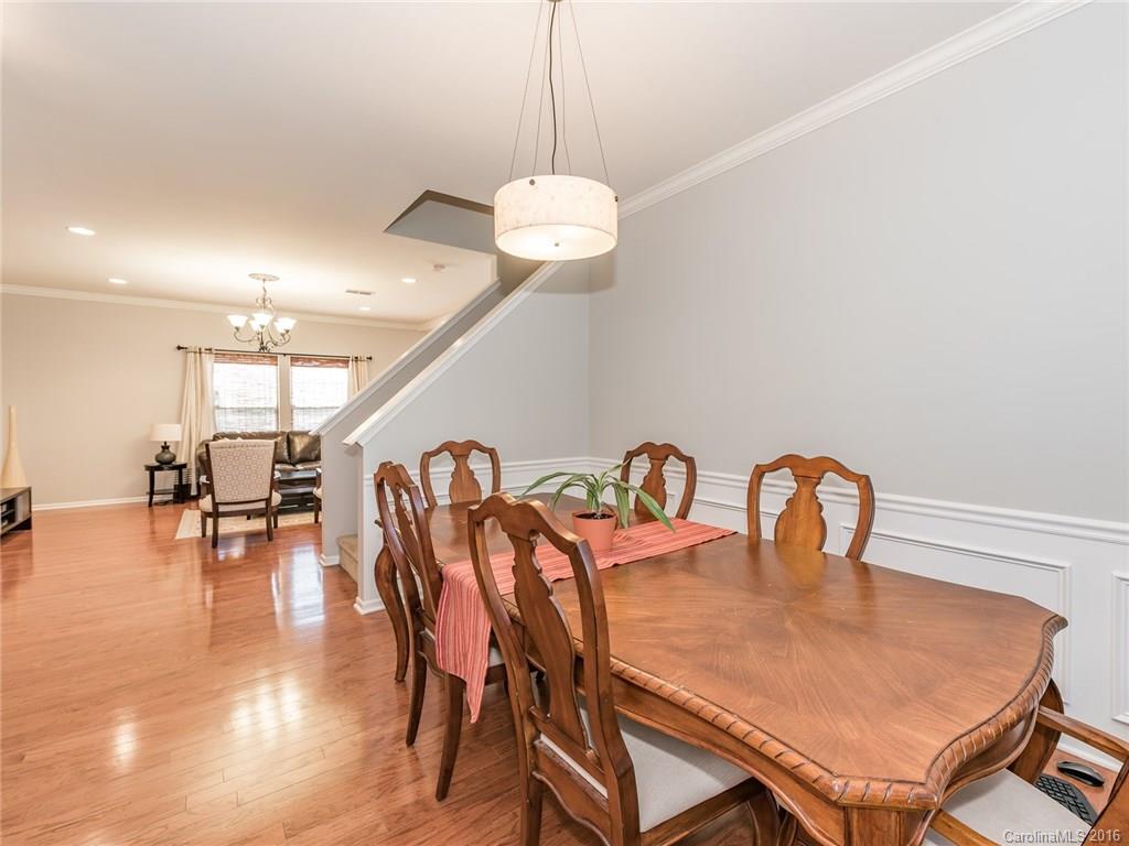 2226 Durand Road Fort Mill, SC 29715 - Photo 4 of 24 a dining room with furniture and wooden floor
