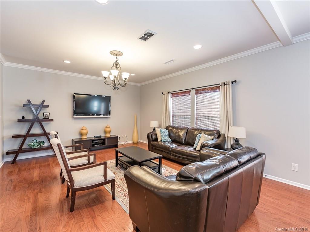 2226 Durand Road Fort Mill, SC 29715 - Photo 6 of 24 a living room with furniture and a flat screen tv