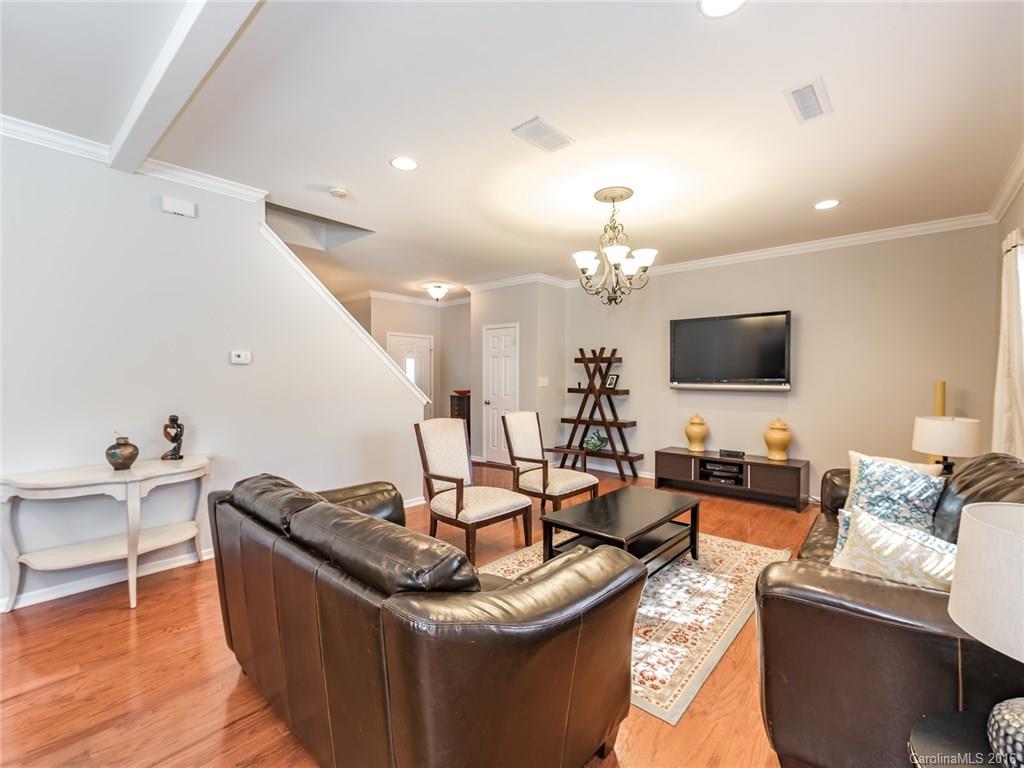 2226 Durand Road Fort Mill, SC 29715 - Photo 7 of 24 a living room with fireplace furniture and a flat screen tv