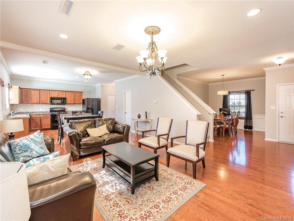 2226 Durand Road Fort Mill, SC 29715 - Photo 8 of 24 a living room with furniture and a wooden floor