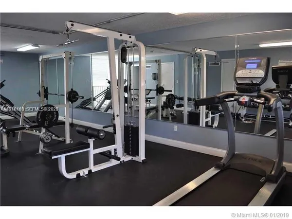 a view of a room with gym equipment