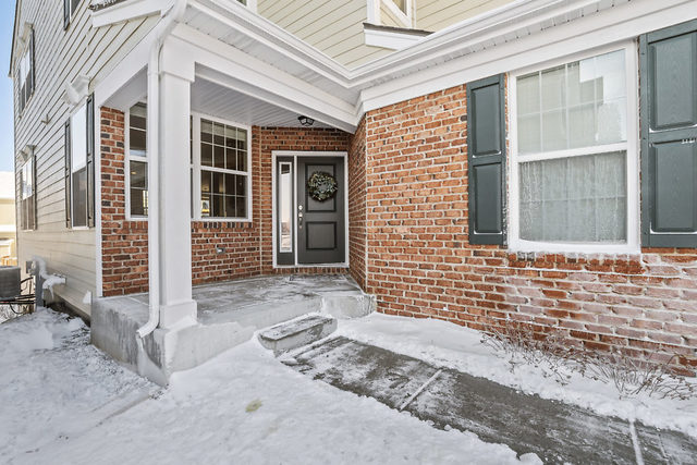1244 Falcon Ridge Drive Elgin, IL 60124 - Photo 1 of 23 a front view of a house