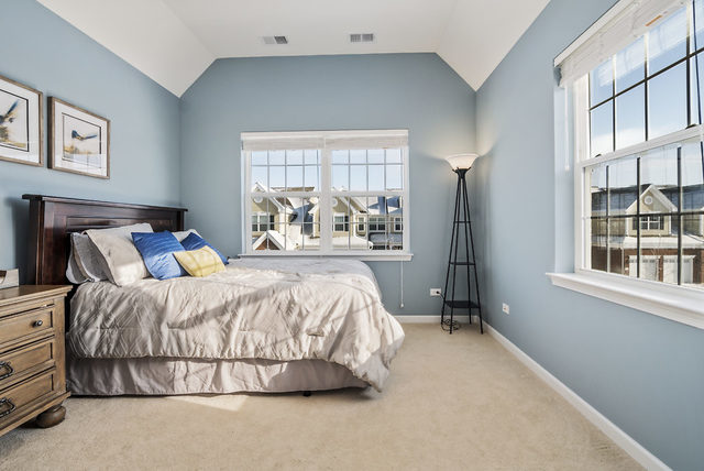 1244 Falcon Ridge Drive Elgin, IL 60124 - Photo 17 of 23 a bedroom with a bed and window