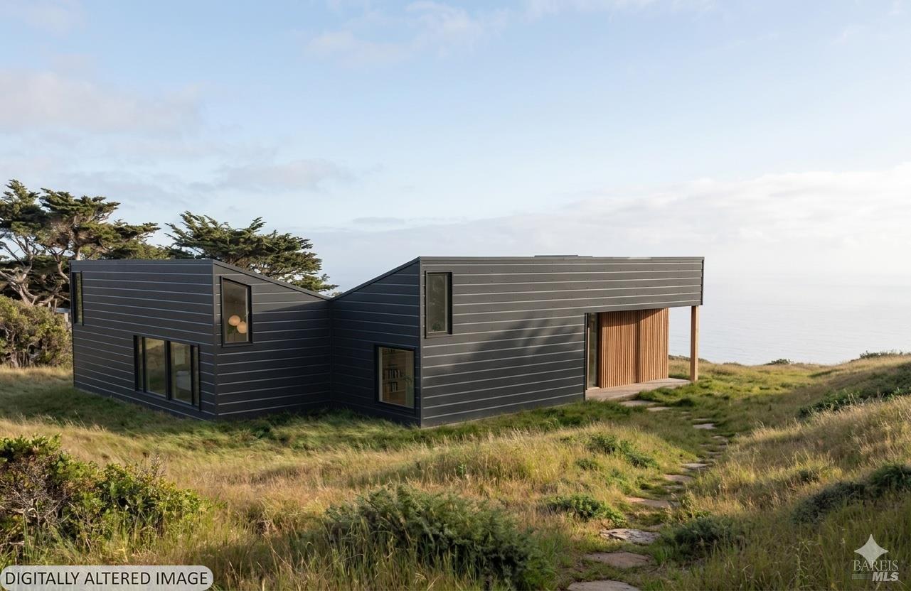 35427 Sea Gate Road The Sea Ranch, CA 95497 - Photo 2 of 35 Owners AI interpretation of the house design set in a green landscape. The landscape is NOT identical to the location of the lot.