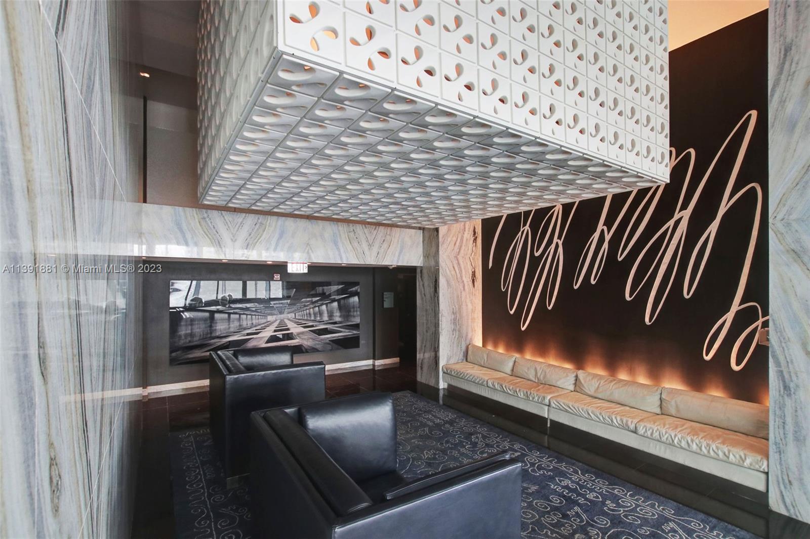 335 South Biscayne Boulevard, Unit 3103 Miami, FL 33131 - Photo 23 of 35 a kitchen with windows