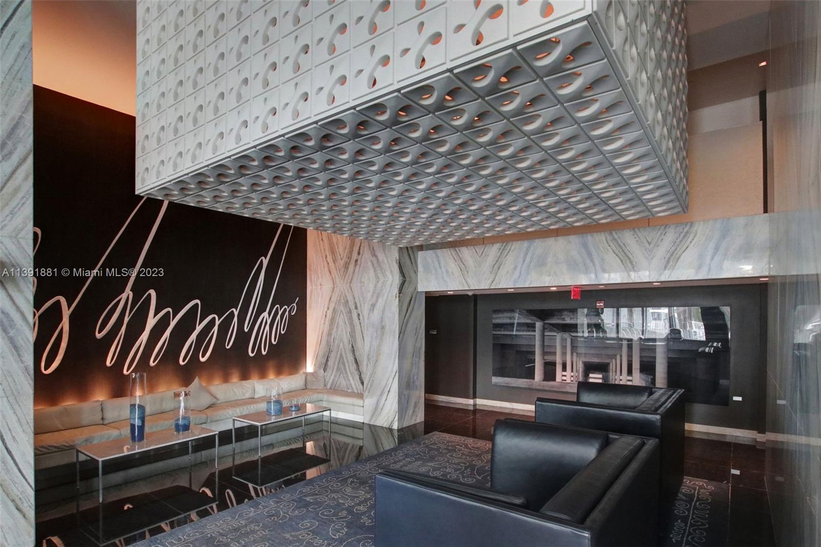 335 South Biscayne Boulevard, Unit 3103 Miami, FL 33131 - Photo 25 of 35 a outdoor living space with furniture