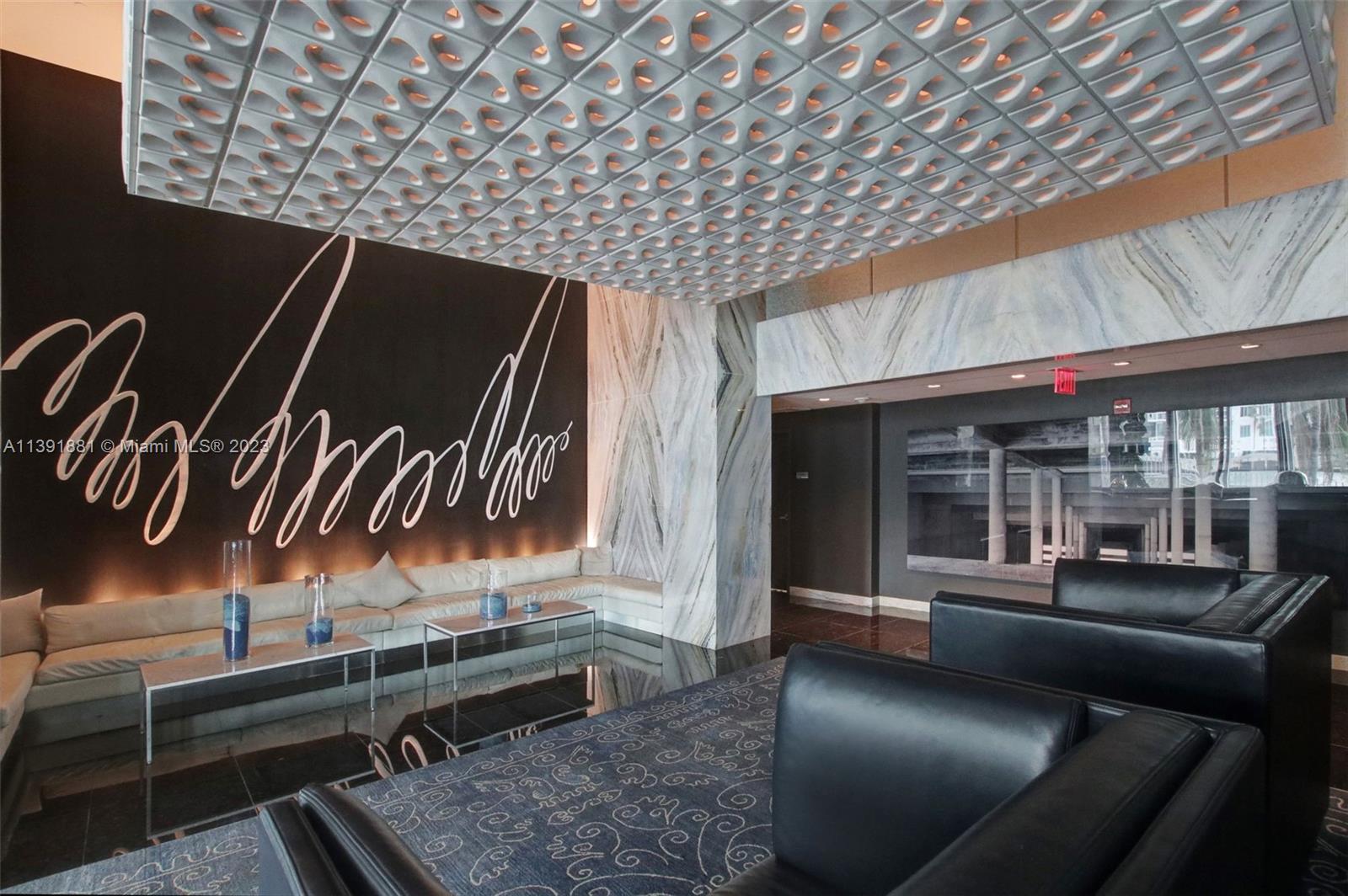 335 South Biscayne Boulevard, Unit 3103 Miami, FL 33131 - Photo 26 of 35 a view of livingroom with furniture and window