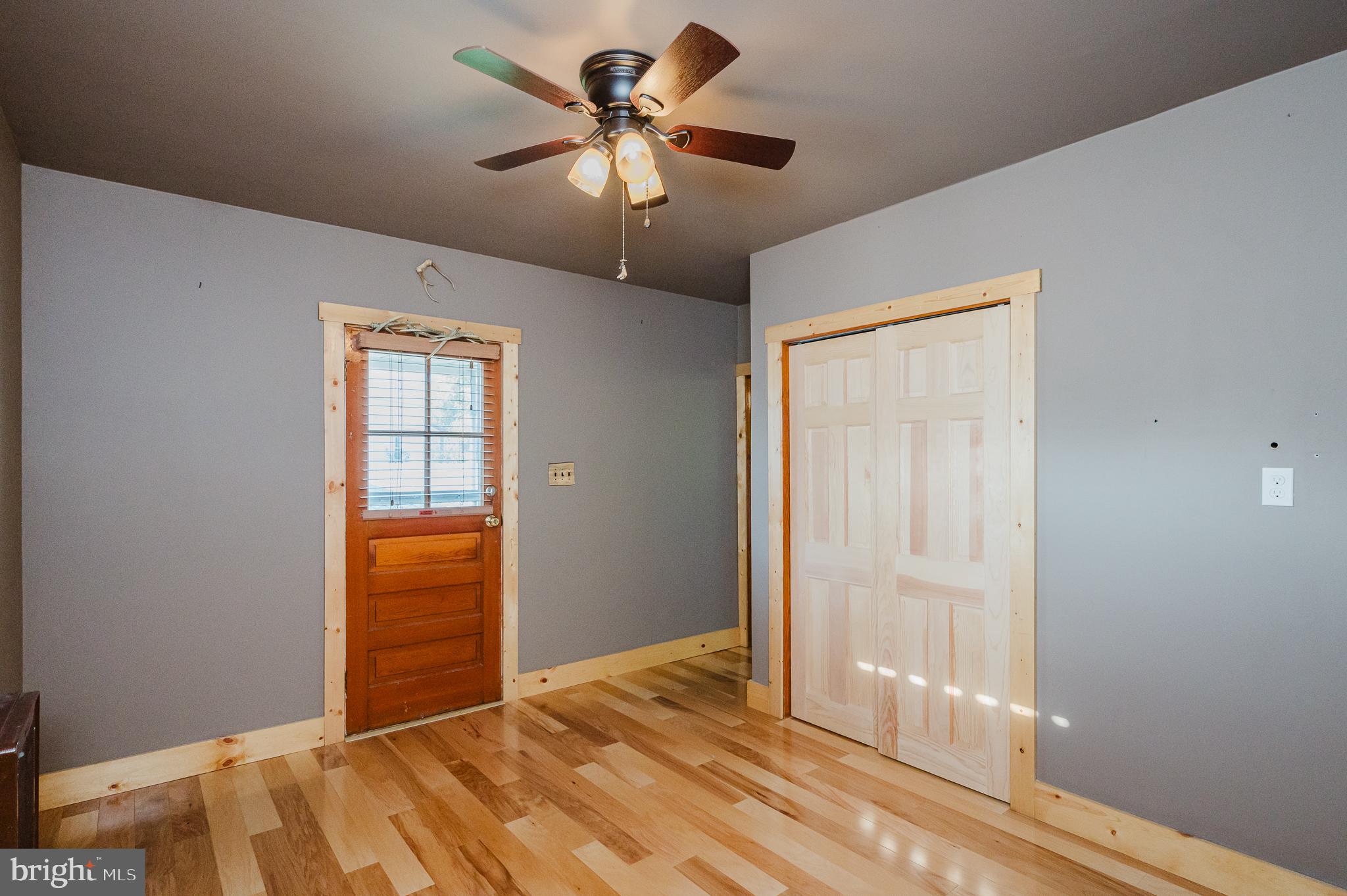 315 Pinewood Road Dundalk, MD 21222 - Photo 12 of 44 a view of livingroom with a ceiling fan and window