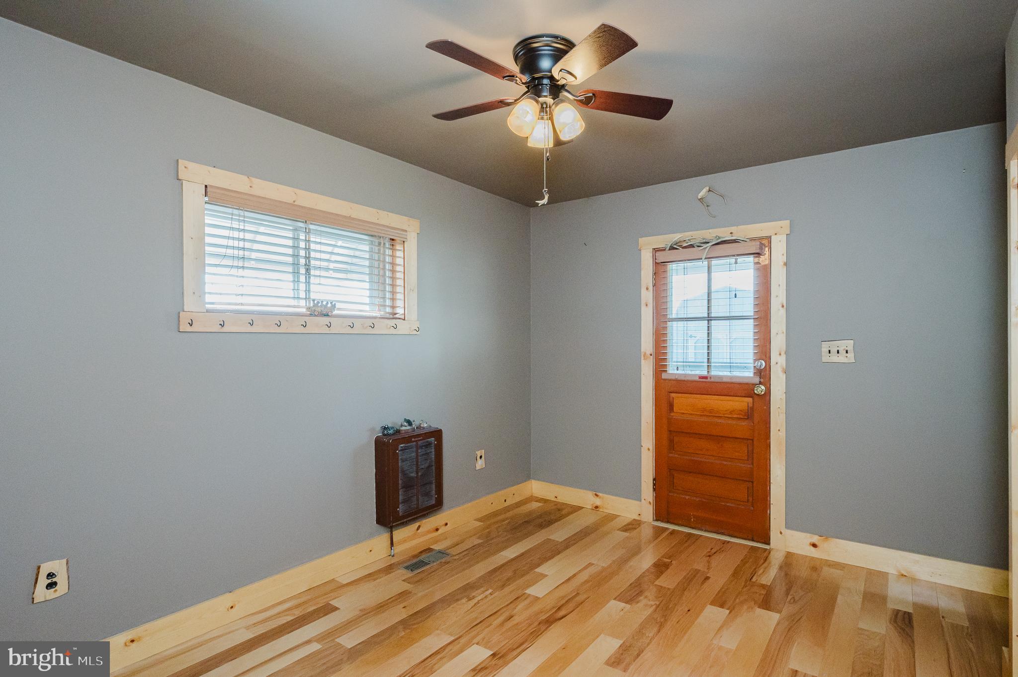 315 Pinewood Road Dundalk, MD 21222 - Photo 13 of 44 a bedroom with a bed and a window