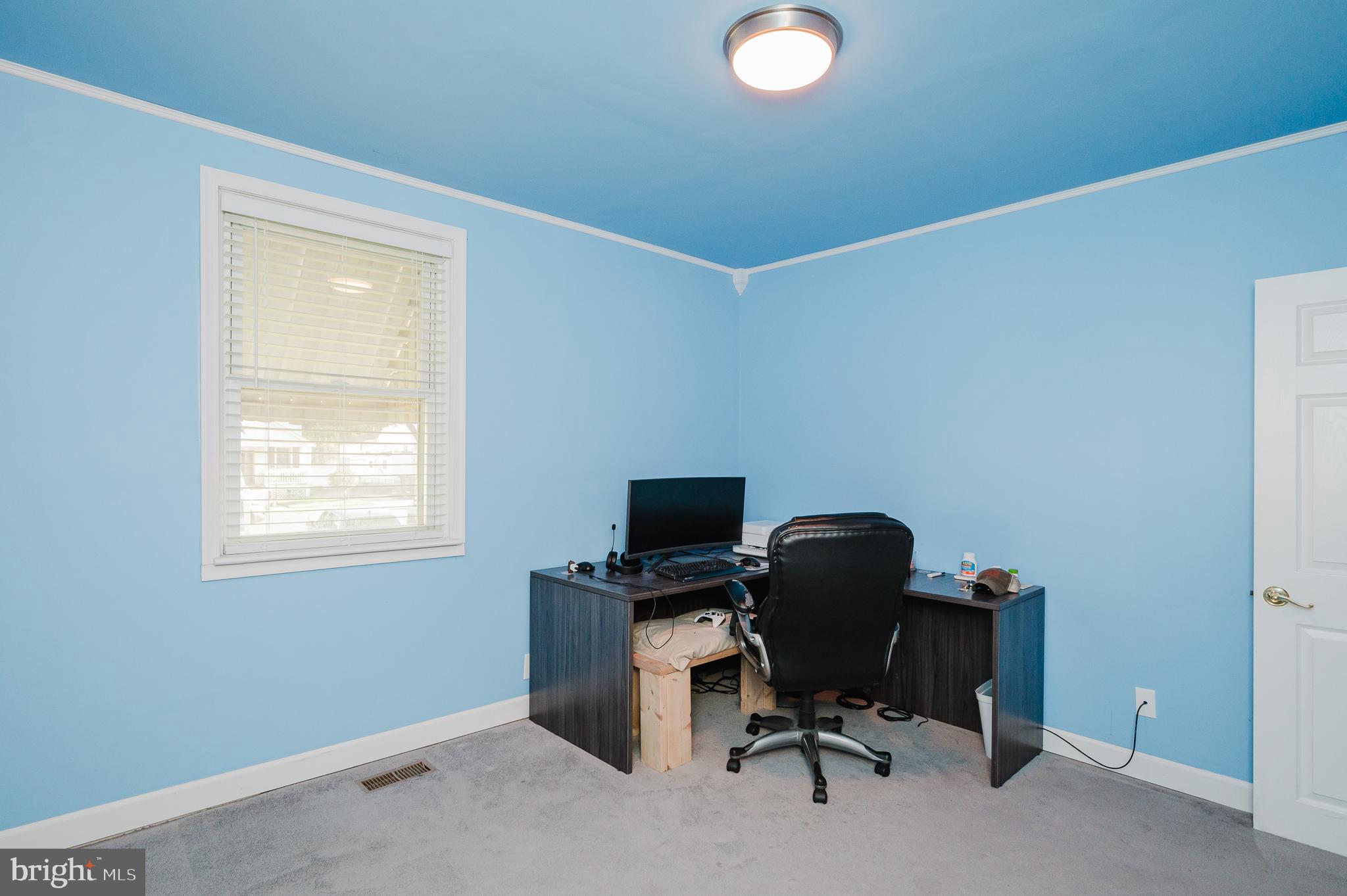 315 Pinewood Road Dundalk, MD 21222 - Photo 26 of 44 a view of a workspace with furniture and a window