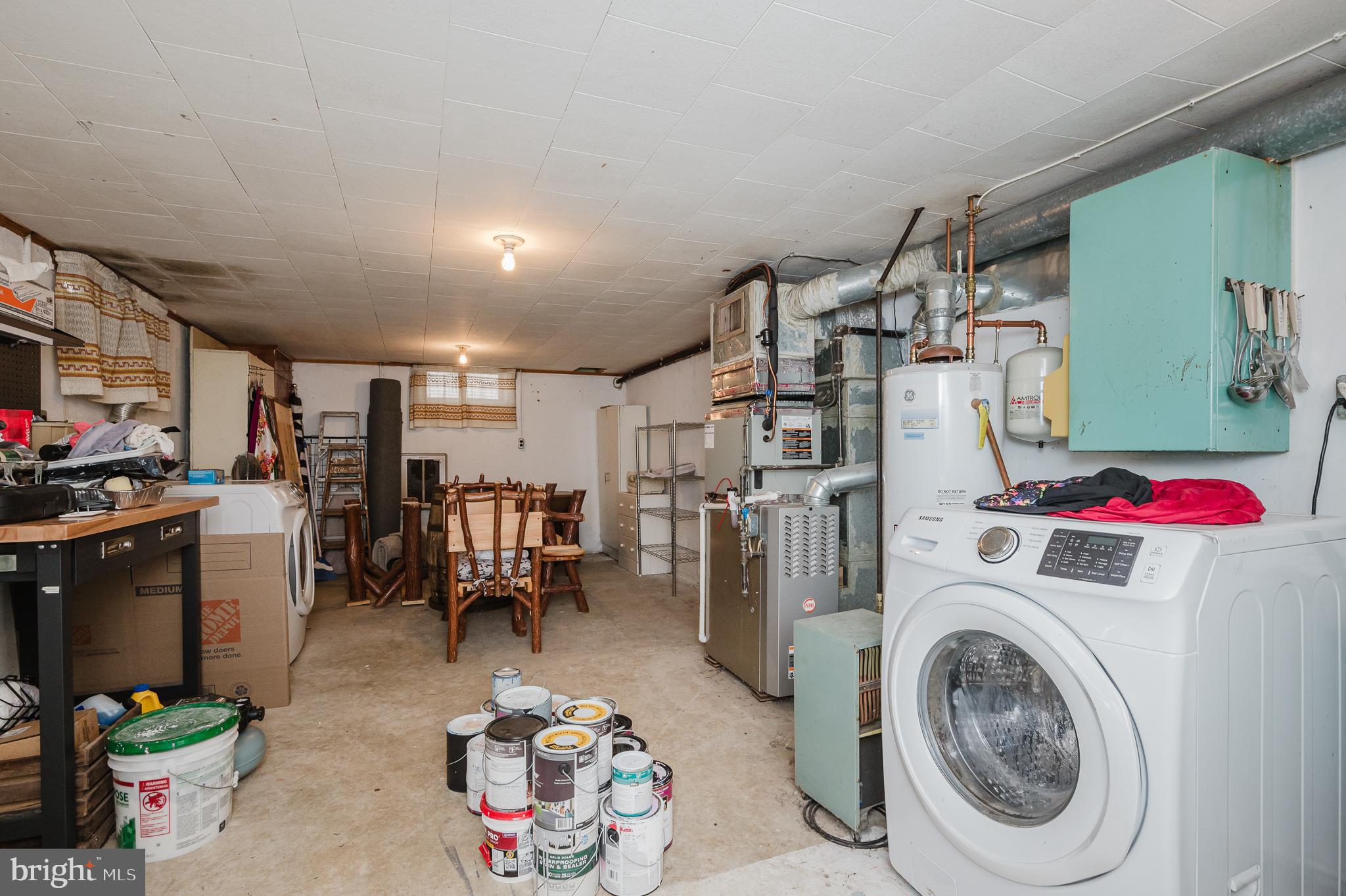 315 Pinewood Road Dundalk, MD 21222 - Photo 33 of 44 a view of a storage & utility room with washer and dryer