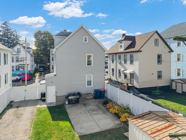 a view of house with yard and entertaining space