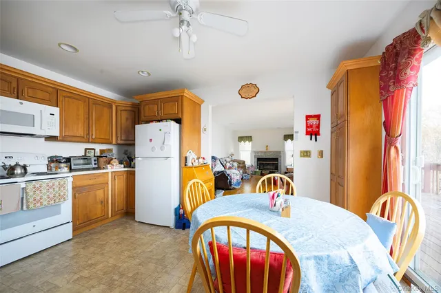 a living room with furniture window and wooden floor