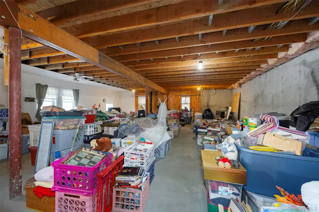 a room with furniture and a flat screen tv